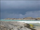 Rain clouds over Kiloran Bay